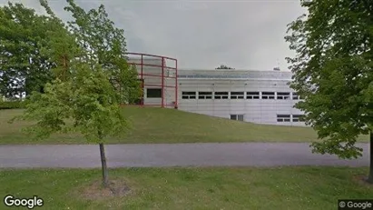 Bedrijfsruimtes te huur in Husie - Foto uit Google Street View